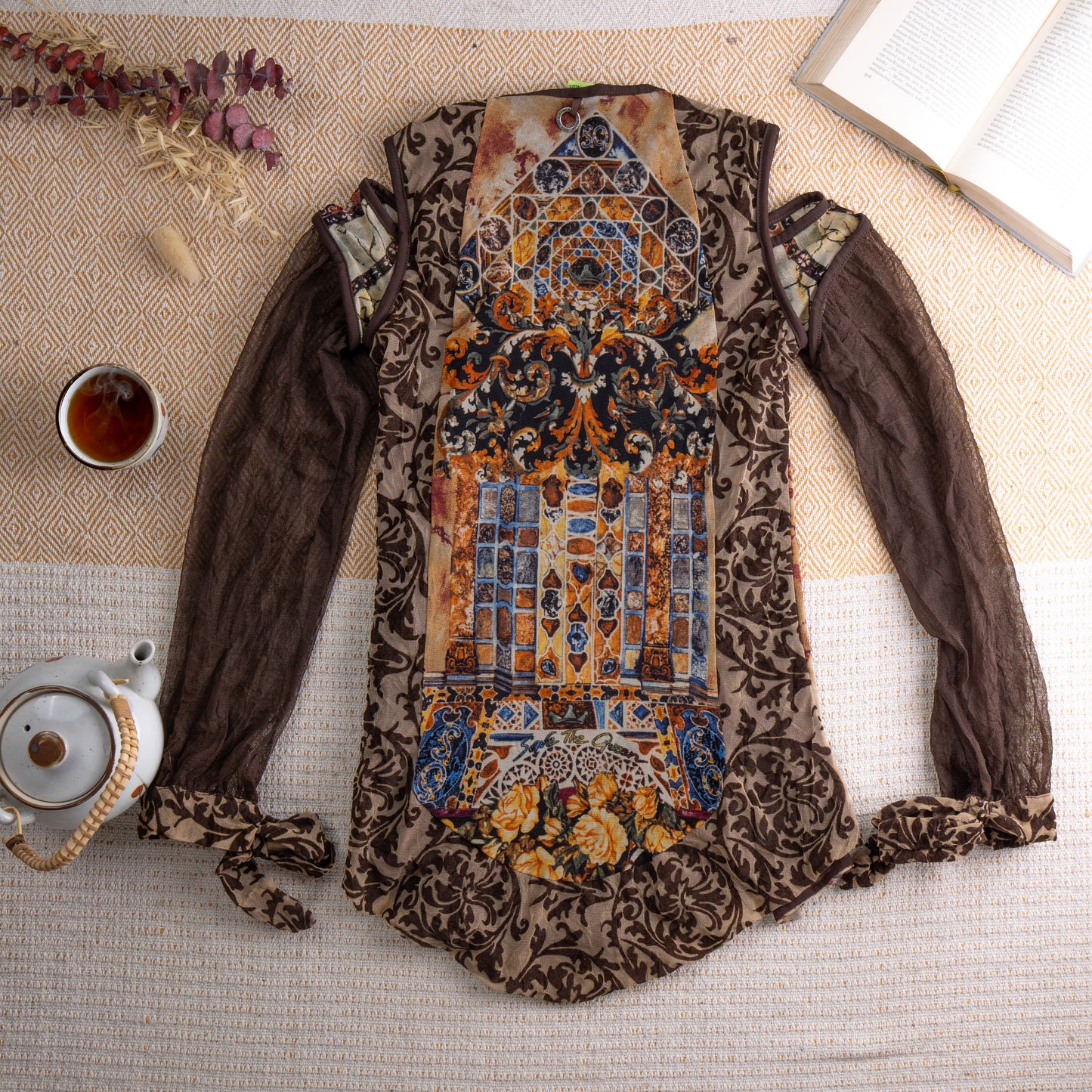 back view Vintage Save the Queen Y2K Sheer Mesh Tunic Top – dark chocolate brown sheer mesh with tonal baroque damask print, cold shoulder cut-out with zip detail, long bishop sleeves with self-tie cuffs, patchwork front panel combining marble print and blue floral tapestry fabric, fairy grunge maximalist aesthetic, Save the Queen label, flat lay editorial shot