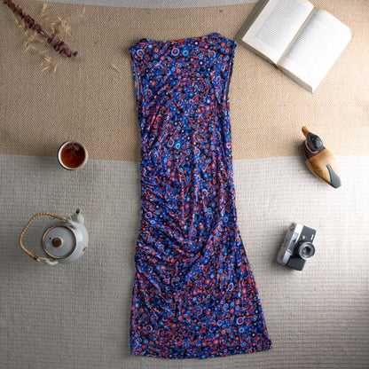 back view Vintage Versus Versace 90s Ruched Midi Dress – cobalt blue stretch mesh with all-over psychedelic pop art circle and star print in red, pink and white, scoop neckline, sleeveless, side ruching creating draped body-con silhouette, archival designer piece, flat lay editorial shot