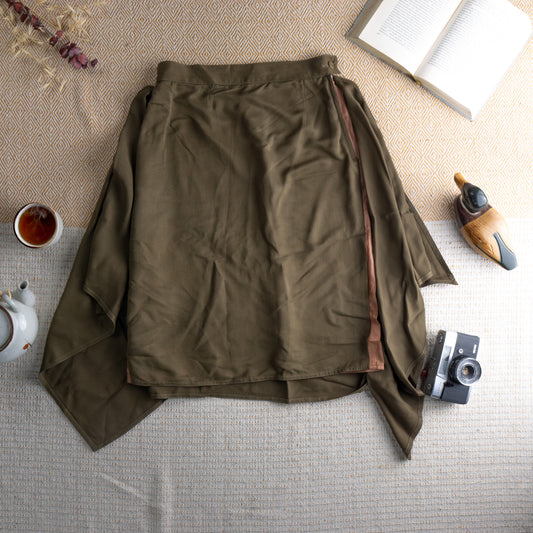 Vintage Max Mara 90s Silk Cupro Midi Skirt – olive army green fluid silk-cupro, high waist with single button closure, dramatic deep side slits revealing blush lining, asymmetric draped hem, minimalist Italian luxury, flat lay editorial shot