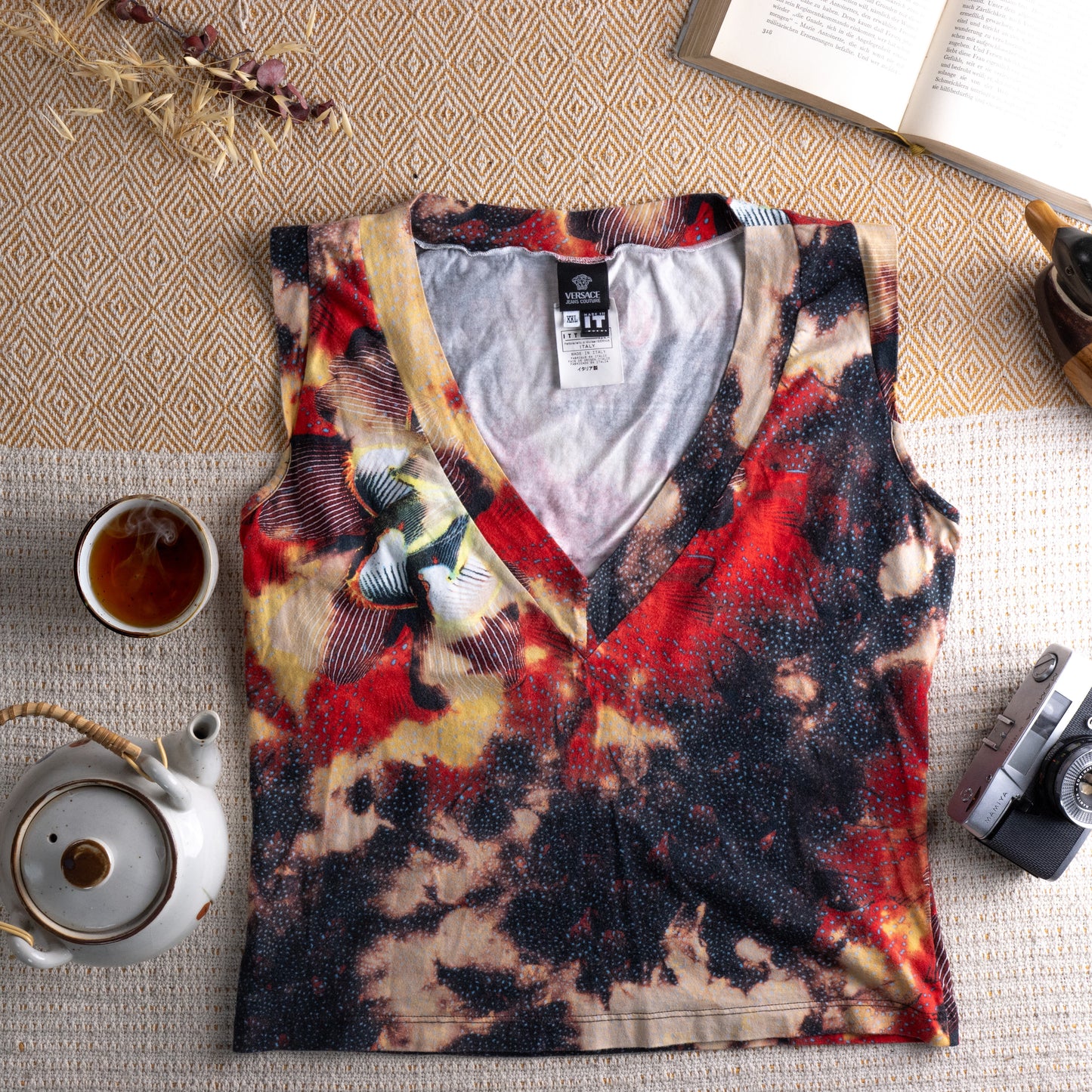 Vintage Versace Jeans Couture 90s Y2K Floral Gothic Print Tank Top – dark abstract floral print in crimson red, black, sand and yellow on cotton, deep V-neckline, sleeveless, relaxed boxy fit, Versace Jeans Couture label, ITTIERRE Made in Italy archival designer, flat lay editorial shot
