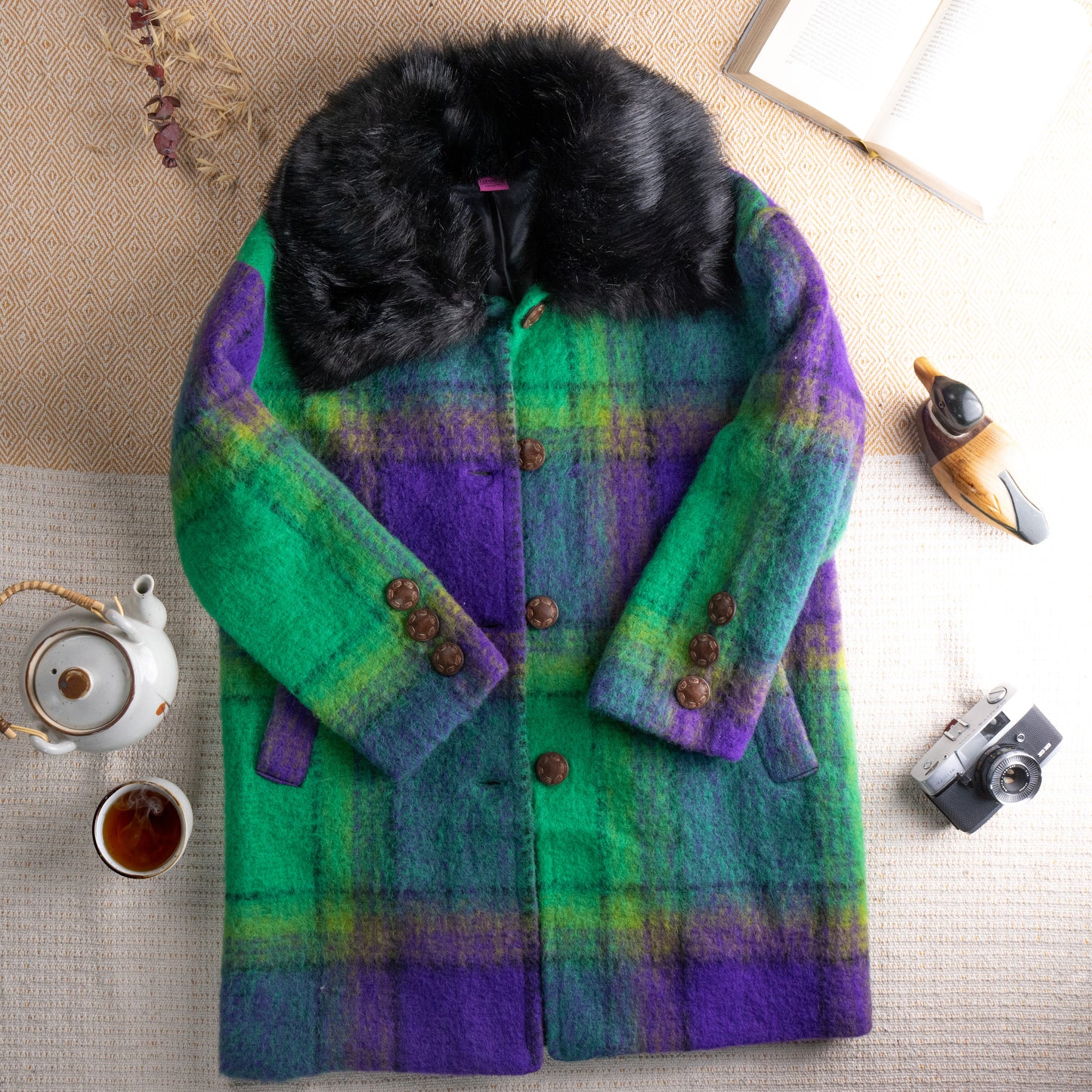 Save the Queen Vintage Mohair Wool Overcoat – bold purple, emerald green and yellow plaid check mohair wool, oversized black faux fur collar, double-breasted with large brown tortoiseshell buttons, long sleeves with button cuffs, midi length, avant-garde Italian luxury winter coat, flat lay editorial shot