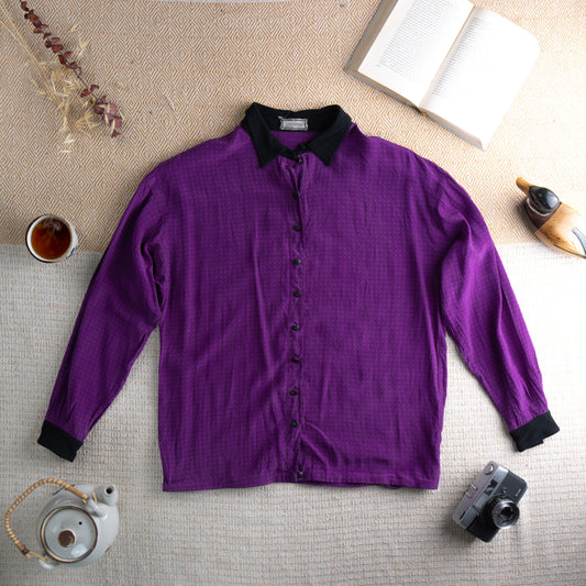 Vintage Gianni Versace 80s Purple Silk Shirt – vibrant amethyst purple silk, contrasting black point collar and button cuffs, black button-front, long sleeves, boxy blouson unisex fit, new wave aesthetic, Made in Italy, flat lay editorial shot