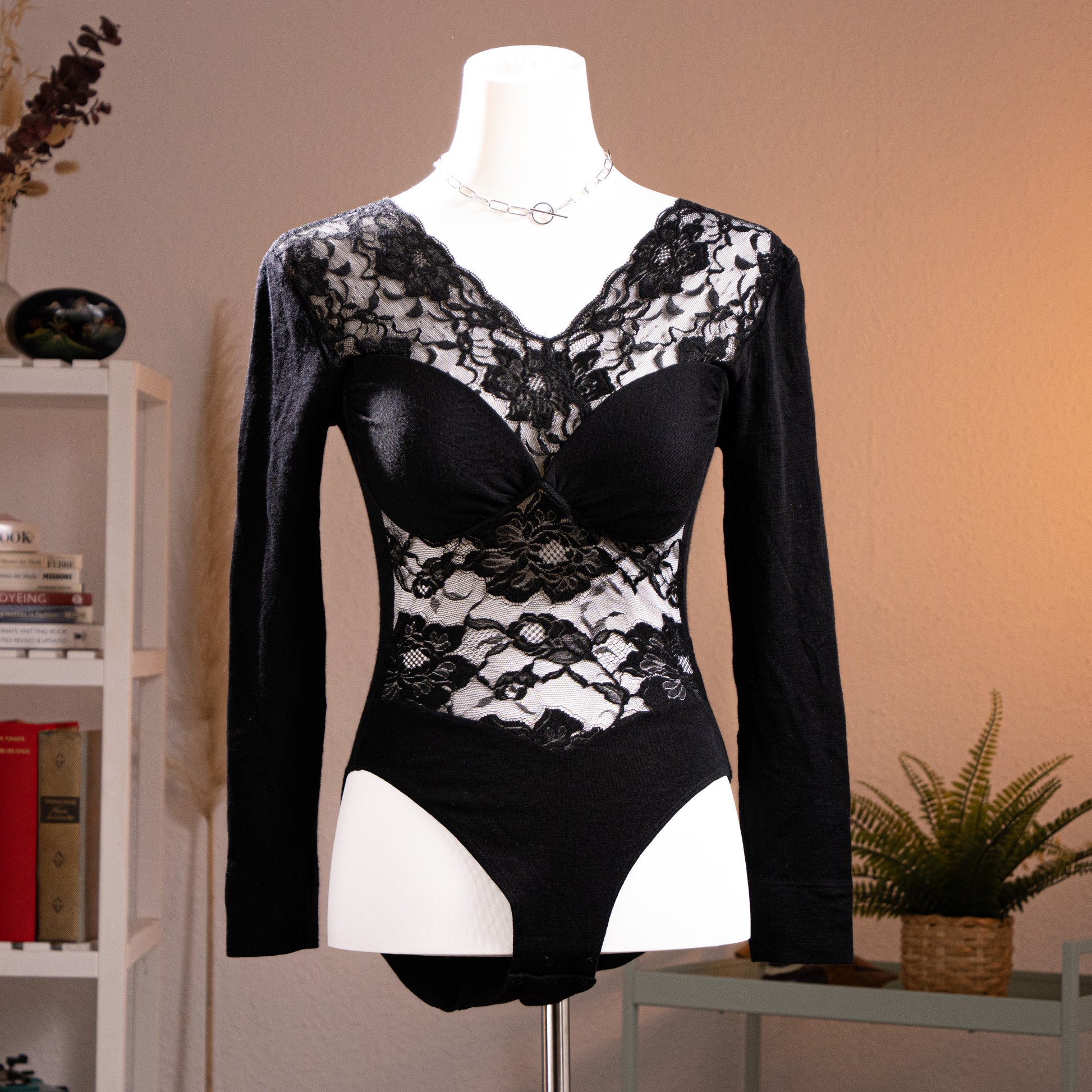 Archival La Perla Tricot 90s NOS Wool Lace Bodysuit – black fine wool long sleeves with sheer floral Leavers lace V-neckline yoke, lace midriff panel, underwired moulded cups, thong cut, museum quality Italian lingerie, product shot on dress form
