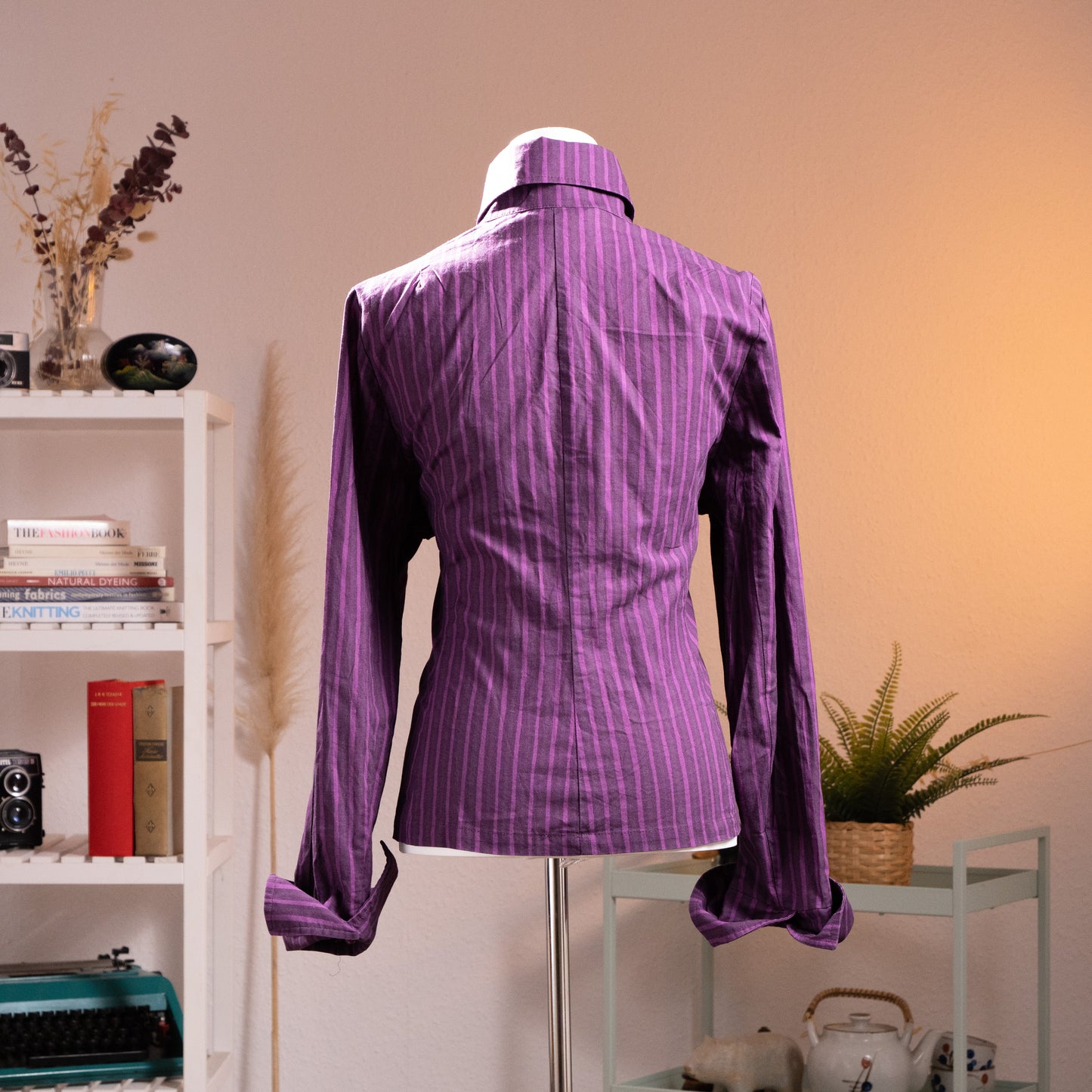 back view Archival Marimekko Ritva Falla Y2K Doubleface Cotton Striped Blouse – deep purple with tonal white pinstripe, point collar, long sleeves with button cuffs, silver snap button-front, fitted silhouette, minimalist unisex oversized Scandinavian design, product shot on dress form