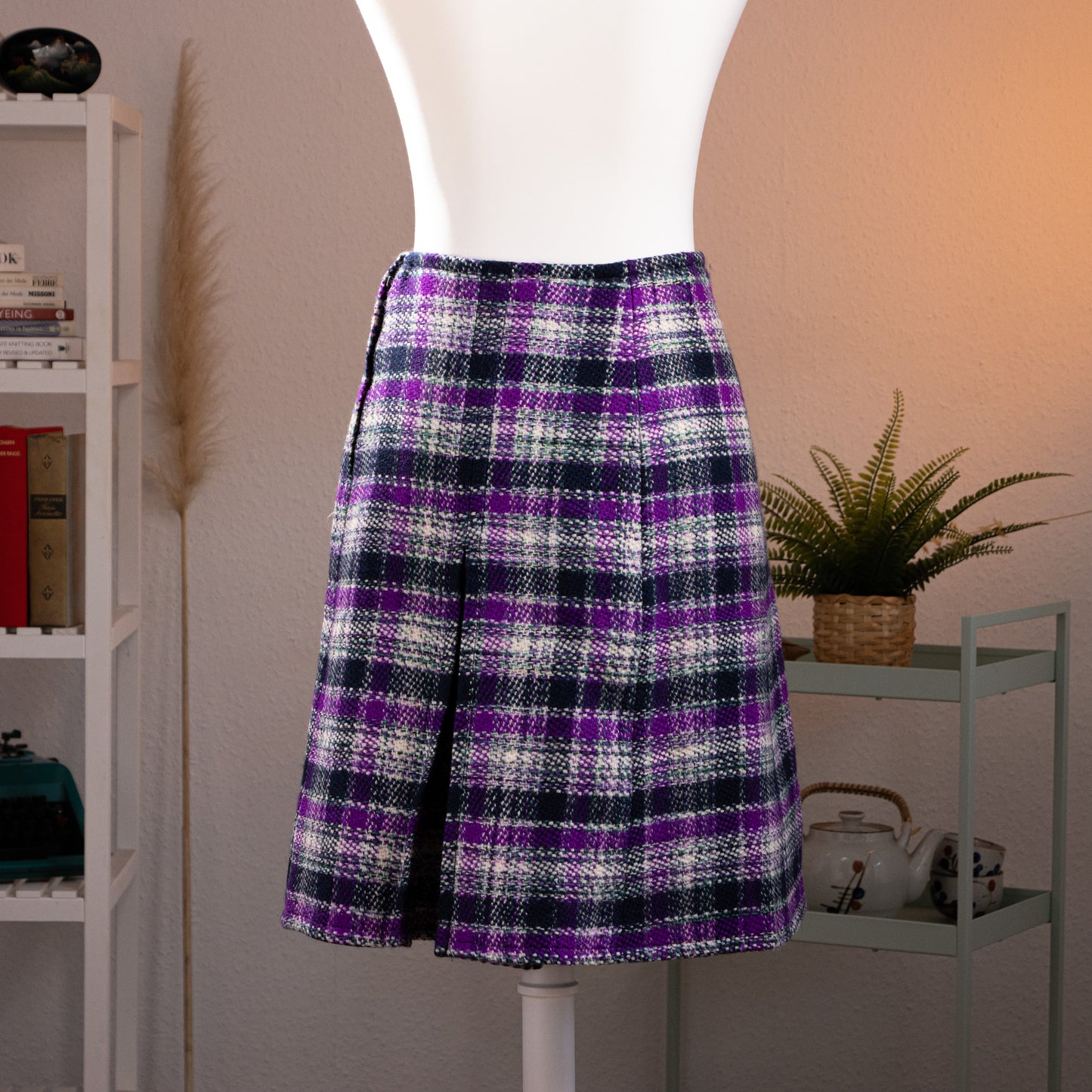 back view Archival Givenchy Nouvelle Boutique 70s–80s Tartan Tweed Skirt – purple, navy and white basketweave wool tartan plaid, high waist with black velvet waistband, front box pleat, A-line midi silhouette, product shot on dress form