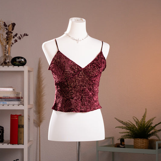 Front view of an archival Lolita Lempicka Paris burgundy devore burnout velvet camisole top displayed on a white mannequin, showcasing the V-neckline and Whimsigoth aesthetic from the late 1990s.
