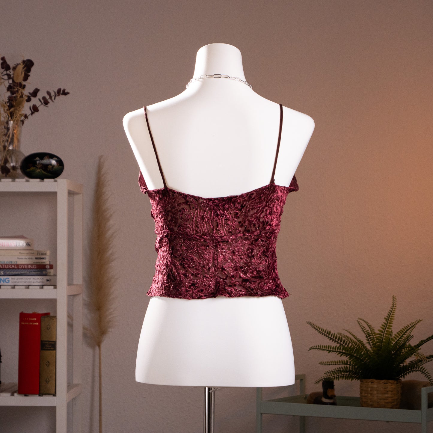 Rear profile view of the vintage Lolita Lempicka burgundy burnout velvet top on a mannequin, showing the low-slung horizontal neckline architecture and parallel micro-fine spaghetti straps.