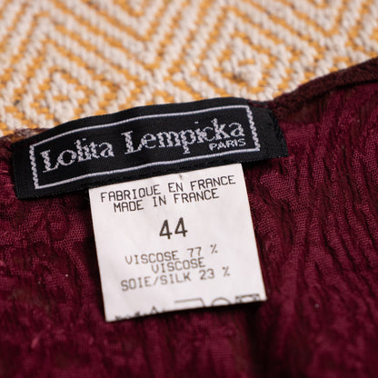 Close-up of the authentic archival woven black Lolita Lempicka Paris neck label with contrast zigzag border, composition tag reading 77% Viscose and 23% Silk, Fabrique en France, Size 44.