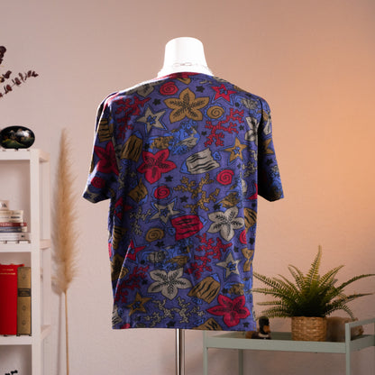 Back view of authentic 1980s Gucci marine life all-over print unisex t-shirt showcasing the continuous fish and coral pattern across the shoulders and back.
