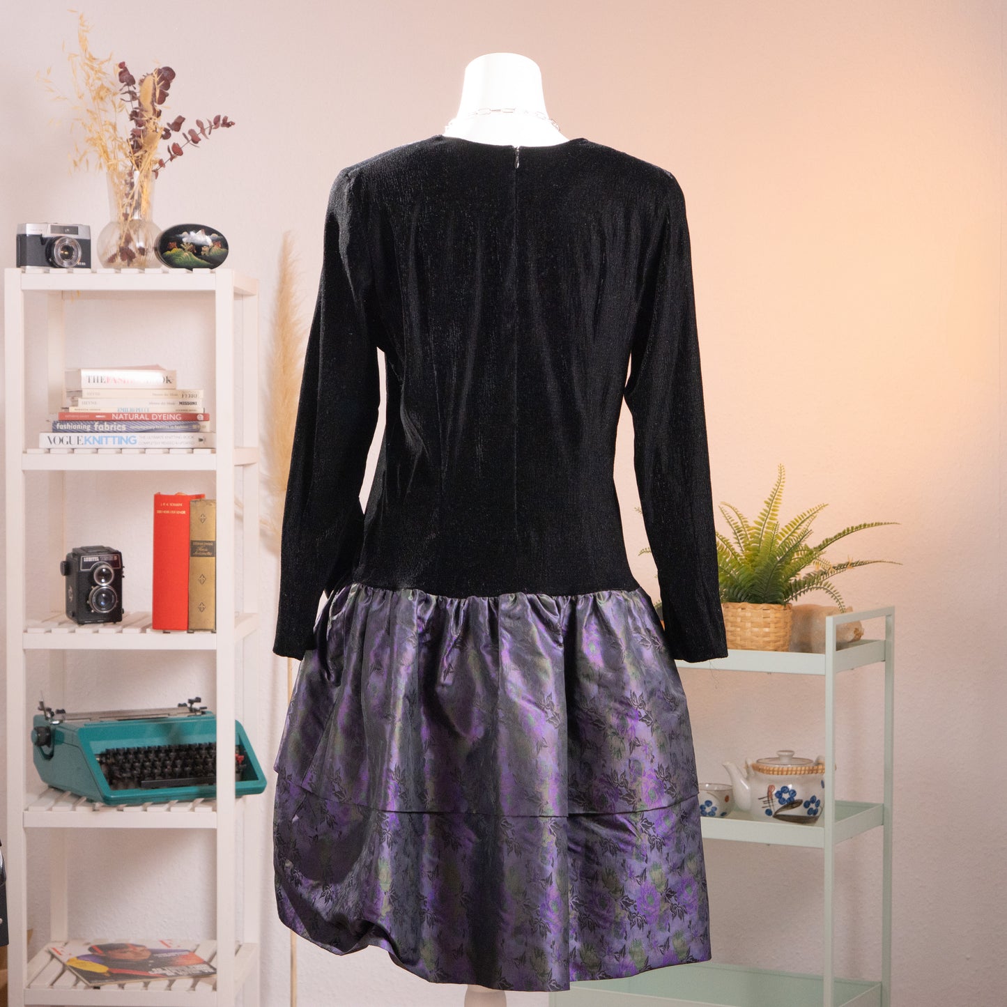 Back view of the vintage KL by Karl Lagerfeld dress showing the clean fit of the long-sleeve bodice and rear concealed zipper.